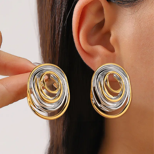 Pendientes vintage en material dorado y plateado