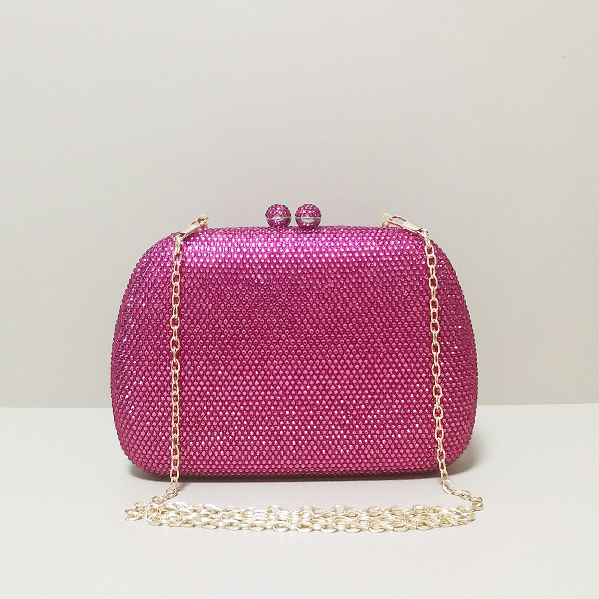 Clutch Fucsia con Cristales – Bolso de Mano Moderno y Brillante para Fiestas y Eventos Nocturnos